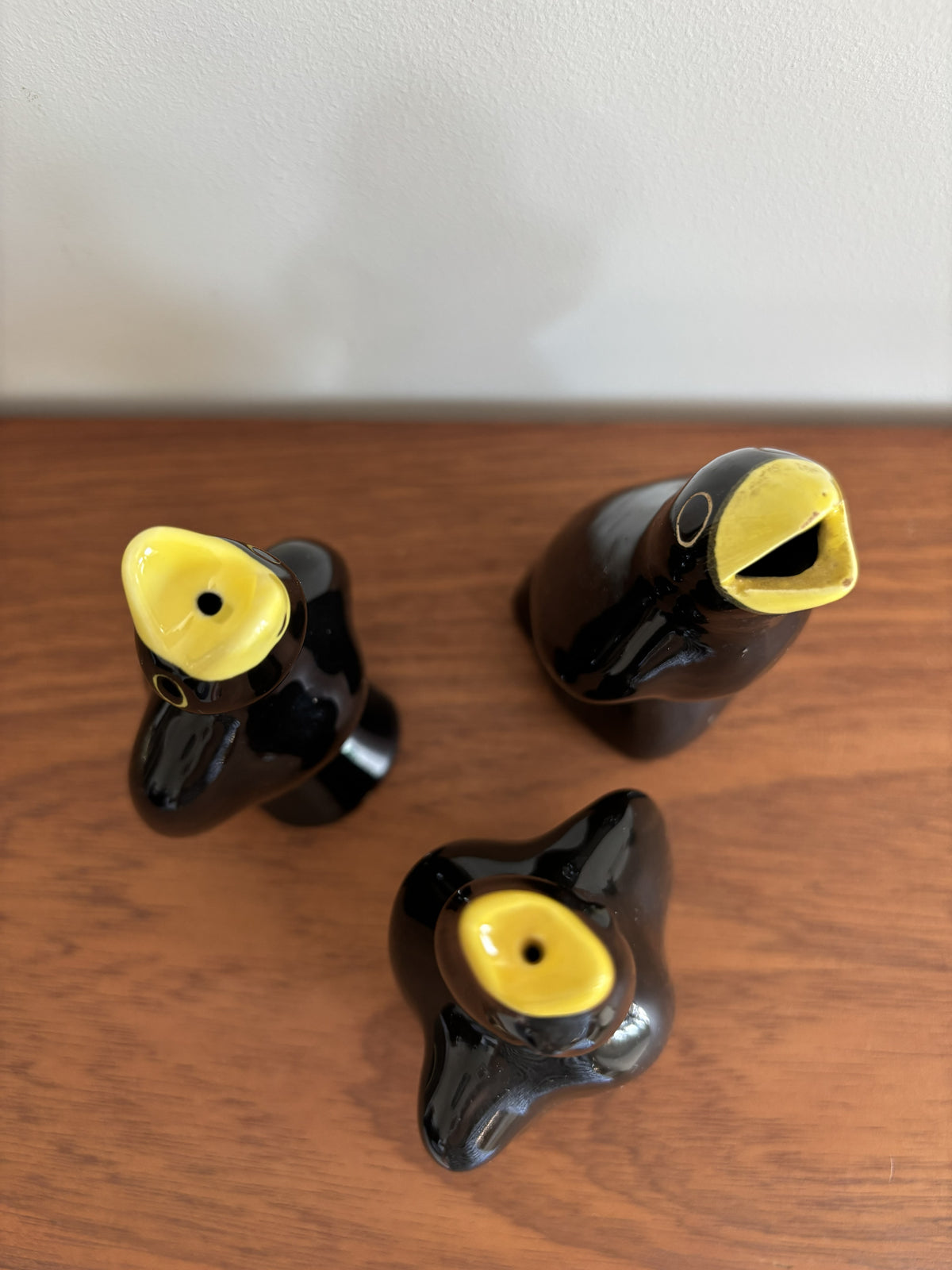 Vintage Blackbird Pie Funnels in glossy black ceramic with yellow beak.