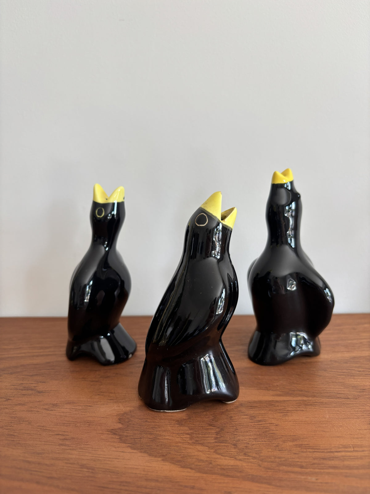 Vintage Blackbird Pie Funnels in  glossy black ceramic with yellow beak. 