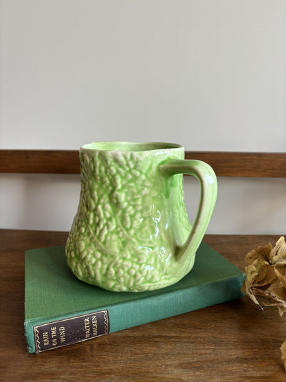 An English Majolica style green cabbage leaf textured jug.  