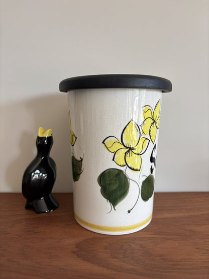 A vintage Toni Raymond Ceramic Storage jar. Featuring yellow flowers and the words Sultanas in black lettering on the front.  