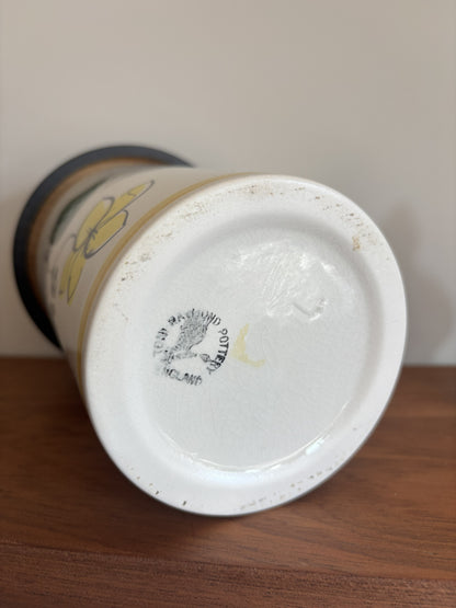 The base of a vintage Toni Raymond Ceramic Storage jar featuring the makers mark of Toni Raymond Pottery, England.  