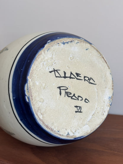 The base of a large Spanish stoneware pitcher featuring the makers mark