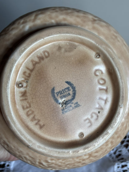 Close-up bottom view of a Vintage Price Bros jug with the words Made in England, Cottage and the Price Bros makers mark.  
